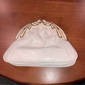 Vintage Judith Lieber white leather clutch with gold and white peacock clasp